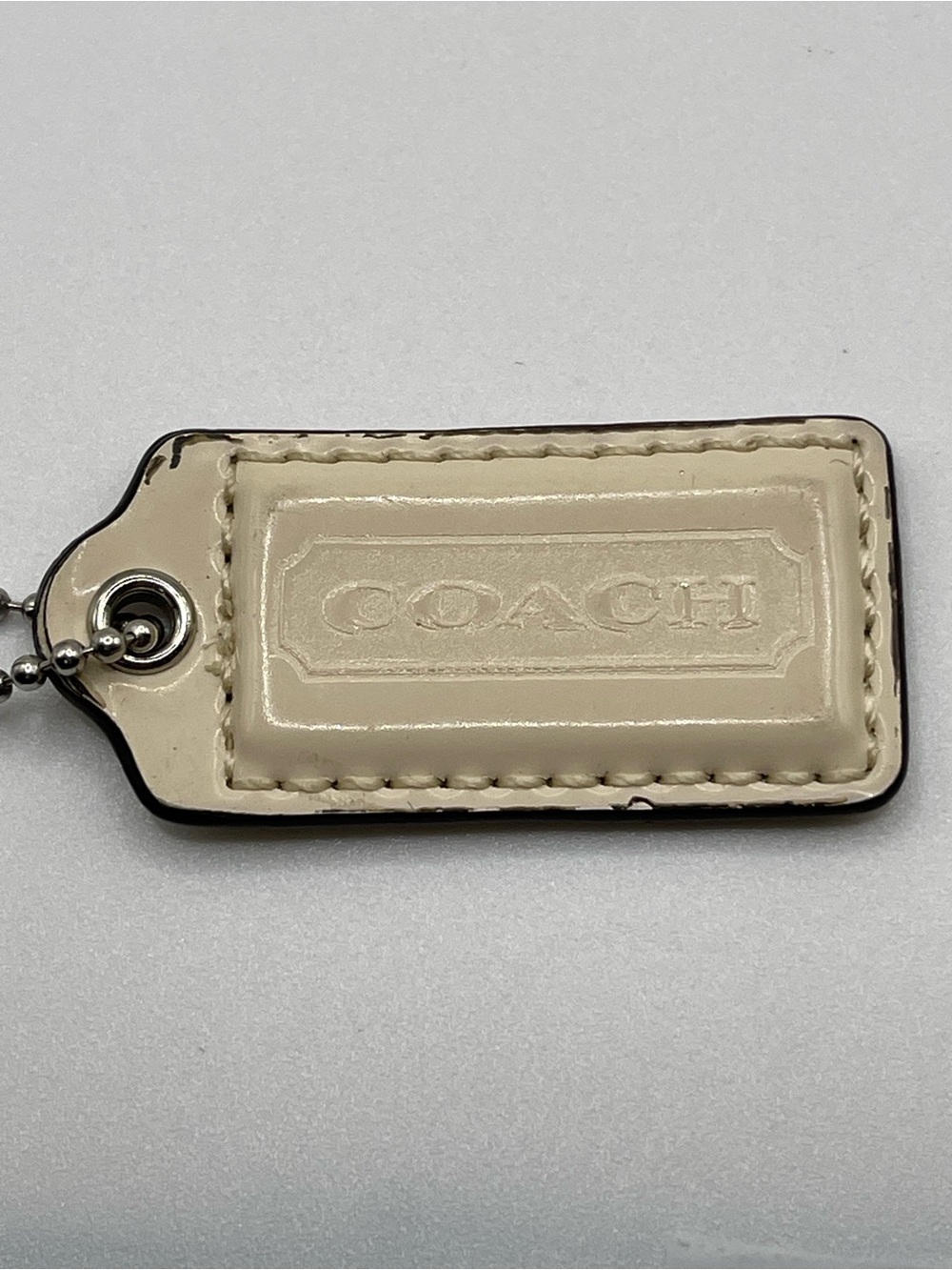 Coach Cream Leather Hang Tag with Ball Chain